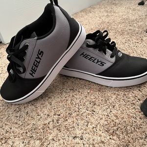 Never worn size 7 boys Heely’s. Still in the box.